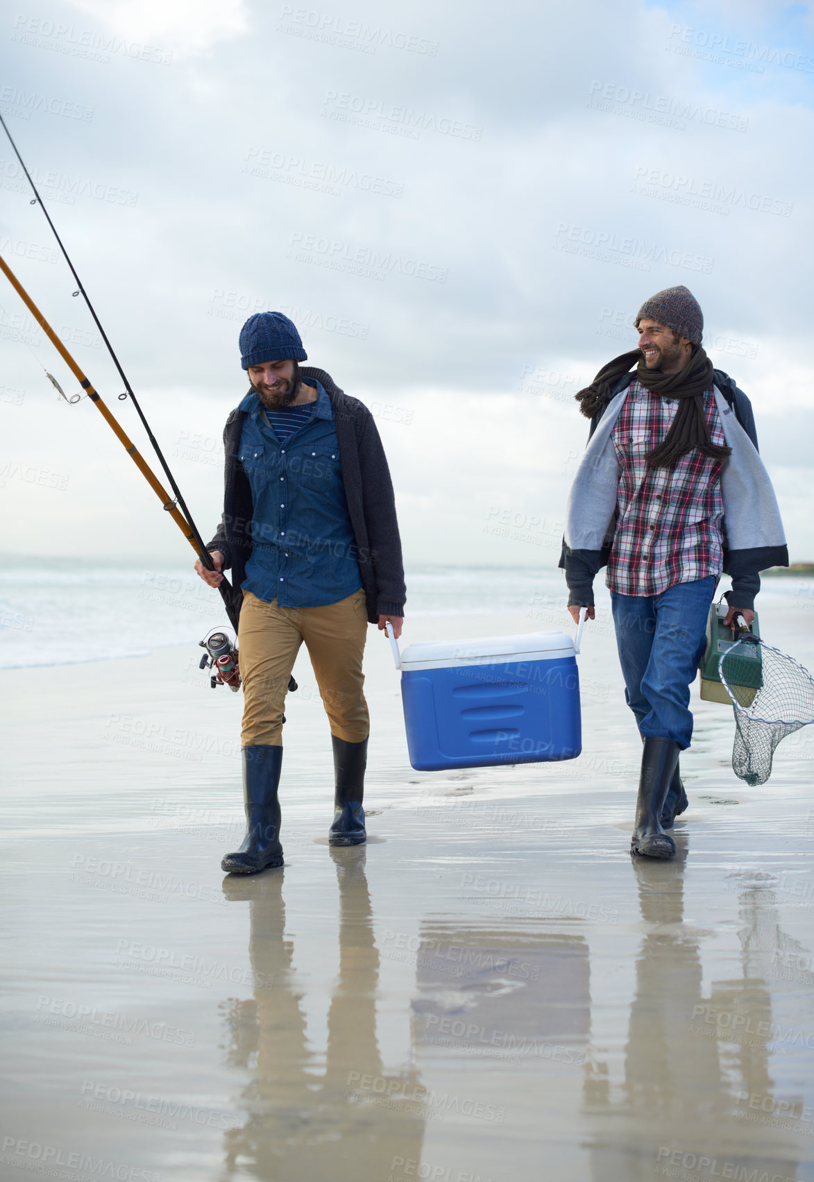 Buy stock photo Waves, fishing and men walking on beach together with cooler, tackle box and holiday conversation. Ocean, fisherman and friends with rods, bait and tools in nature on winter morning vacation at sea.