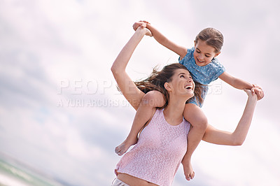 Buy stock photo Happy mother, beach and child on piggyback for fun summer, playful holiday or outdoor weekend in nature. Mom and daughter or kid on shoulders with smile for bonding, love or support by ocean coast