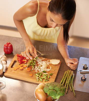 Buy stock photo Cooking, food and chef with woman in kitchen of home to prepare meal for diet or nutrition from above. Health, nutritionist or vegan and hands of person with ingredients for recipe in apartment