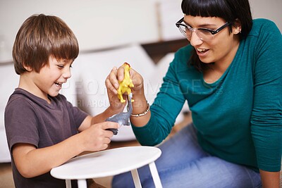 Buy stock photo Mother, son and play with toy, dinosaur and fun in home or house with joy. Woman, child and happiness with smile, youth and childhood development for future growth and bonding or single parent care