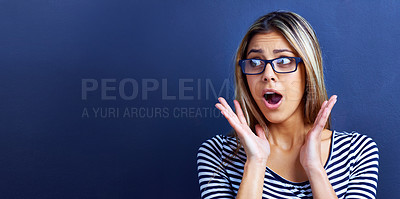 Buy stock photo Studio, news and woman in shock with hands for promo or deal for clothes in fashion, sale and discount. Adult, female person and girl in blue background with glasses, mock up and announcement