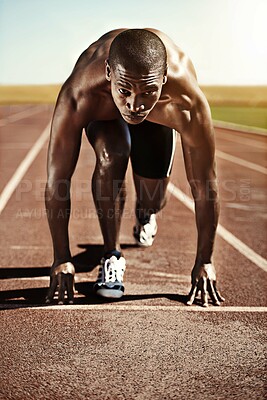 Buy stock photo Portrait, man and ready for race, track and field with practice for competition. Olympics, male runner or athlete with determination on face for sprint, performance or sport by commitment for fitness