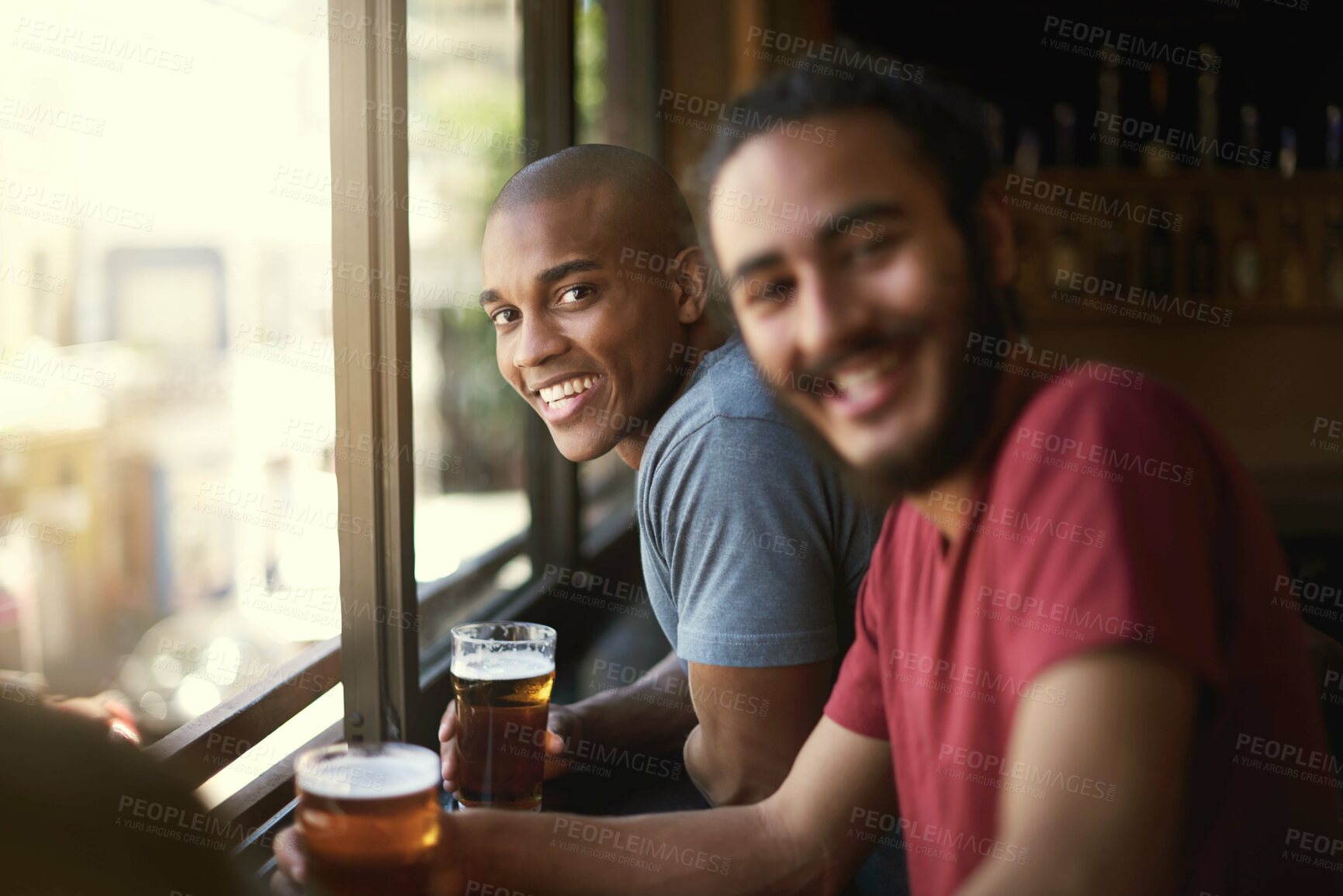 Buy stock photo Portrait of two friends enjoying themselves in the pub