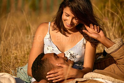 Buy stock photo Love, sunset and relax with couple in field for summer break, picnic and romantic date. Happy, smile and affectionate with man and woman lying in grass of countryside for travel, bonding and peace