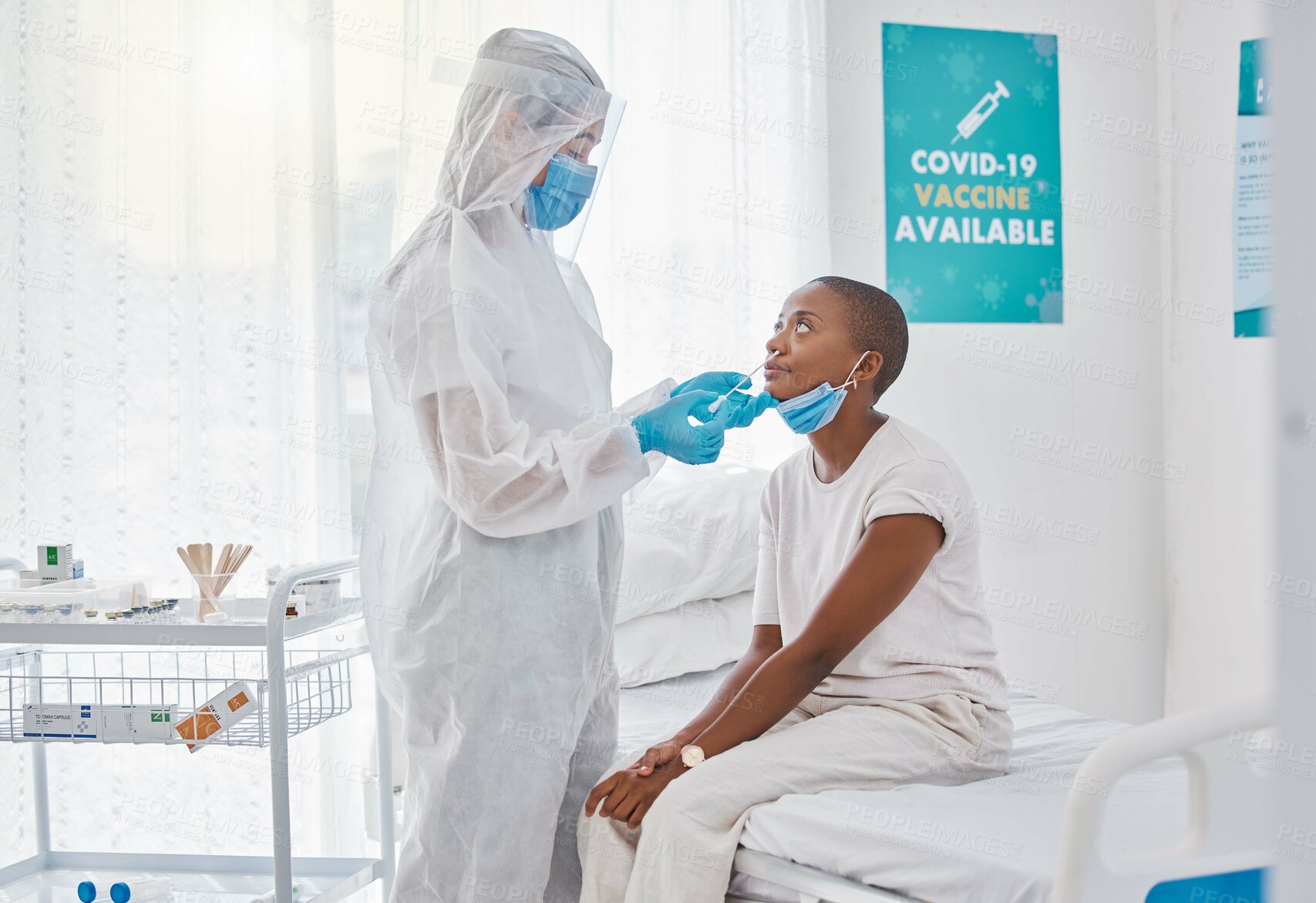 Buy stock photo Corona virus nasal swab of covid patient in a hospital room with testing equipment. Medical worker, nurse or doctor taking nose or nasal sample for protocol, routine covid19 disease test in a clinic