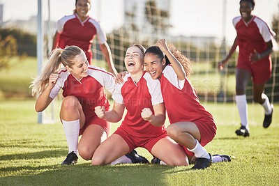 Buy stock photo Celebrate, winning and success female football players with fist pump and hurray expression. Soccer team, girls or friends on a field cheering with victory sign, celebrating win in a sports match