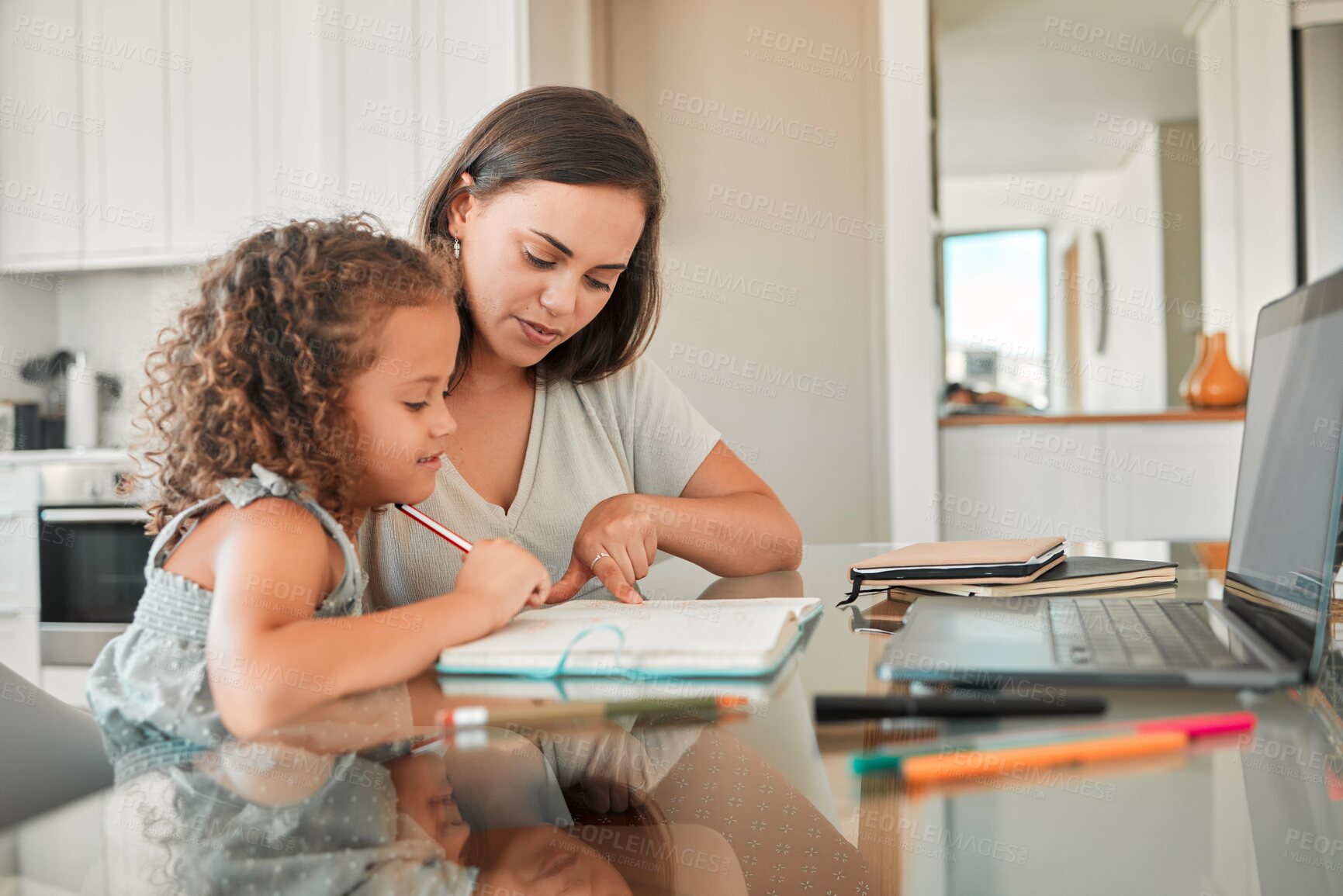 Buy stock photo Mother, child and learning of parent helping her daughter with homework in the kitchen for education at home. Mom teaching her girl school work, project or task in her book together at the house.