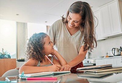 Buy stock photo Homeschool, learning and bonding with a mother and daughter doing homework in the kitchen at home. Happy parent helping her child with a school task, smiling, talking and enjoying time together