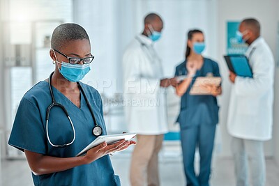 Buy stock photo Healthcare, doctor and black woman on tablet with face mask for research, medical report and results. Hospital, clinic and female worker on digital tech for online service, consulting app or internet