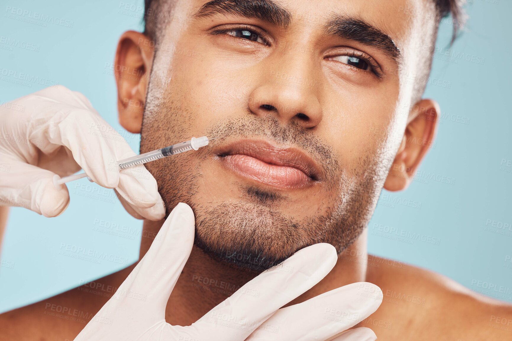 Buy stock photo Beauty, botox and mouth with a man in studio on a gray background for a plastic surgery injection. Hands, skincare and syringe with a young male patient indoor for an antiaging facial filler closeup