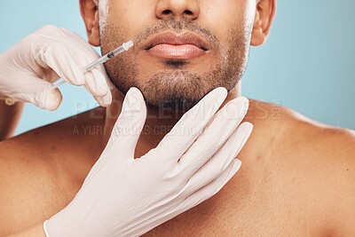 Buy stock photo Skincare, botox and mouth with a man in studio on a gray background for a plastic surgery injection. Hands, beauty and syringe with a young male person indoor for an antiaging facial filler closeup