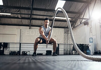 Buy stock photo Man, workout and fitness with rope at gym for health, exercise and body wellness. Healthy, muscle and strong for development for athlete in mma, wrestling or sport at training club, class or studio