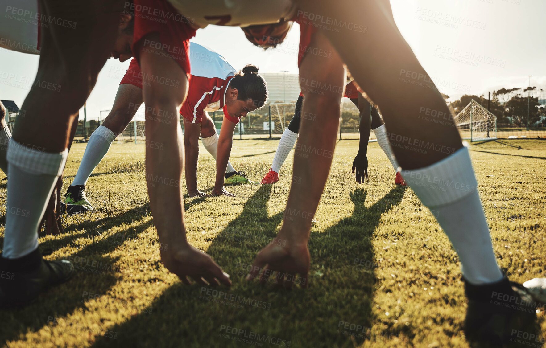 Buy stock photo Soccer field, sports men and stretching body on sports stadium grass to start training, fitness and exercise workout. Football player team group warm up together before competition game performance 