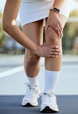 Sports, tennis and woman with knee injury after practice, training or match. Fitness, badminton and female player suffering from sore leg, muscle pain or joint inflammation after exercise or workout.