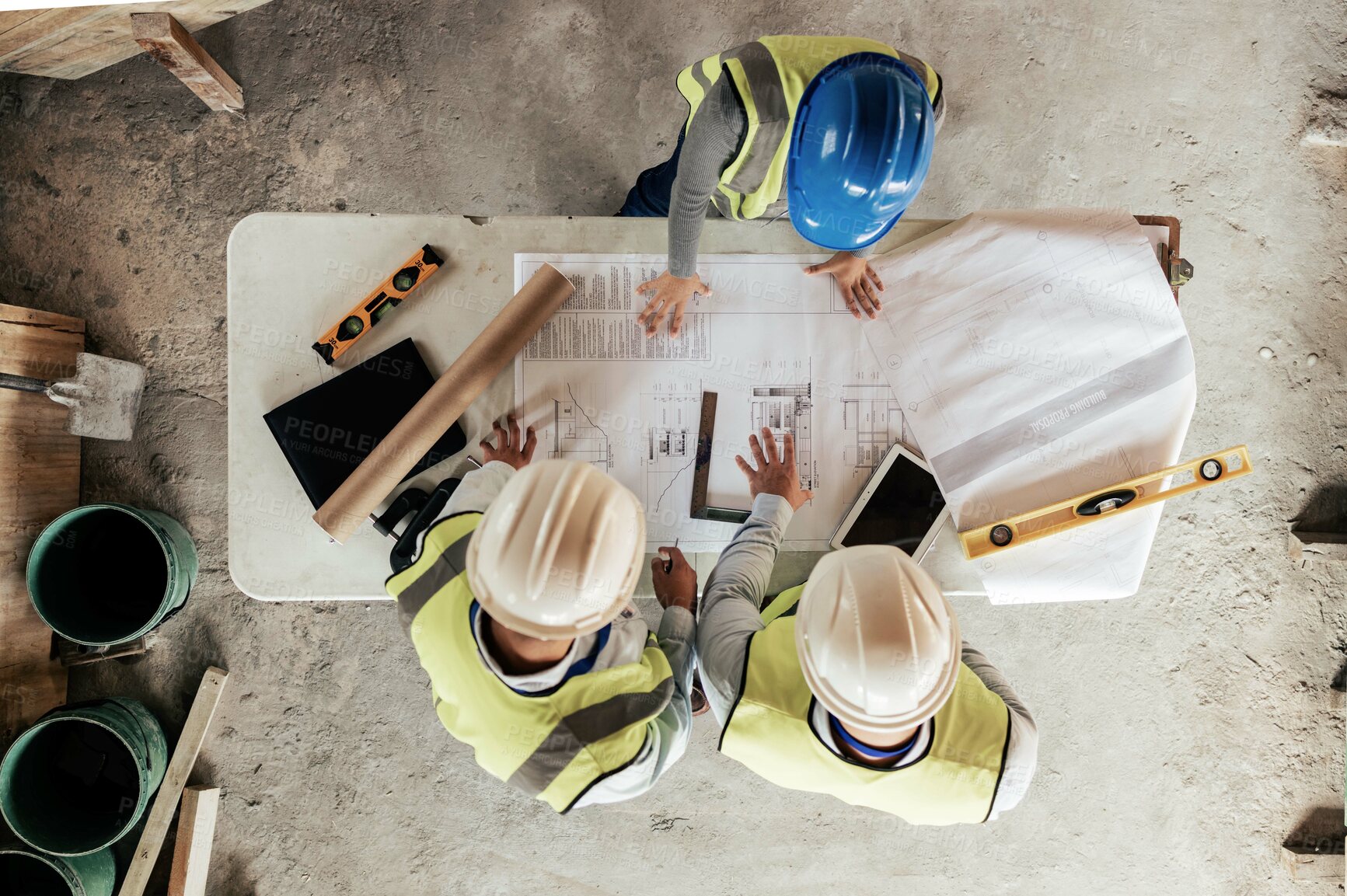 Buy stock photo Architect, construction and blueprint with an engineer and designer team working on a building site from above. Meeting, planning and architecture with a design group in collaboration on a project