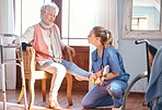 Senior woman, rehabilitation and help for foot injury, disability or pain in nursing home. Physiotherapist, doctor and treatment for feet, ankle or legs with physical therapy, elderly care and nurse