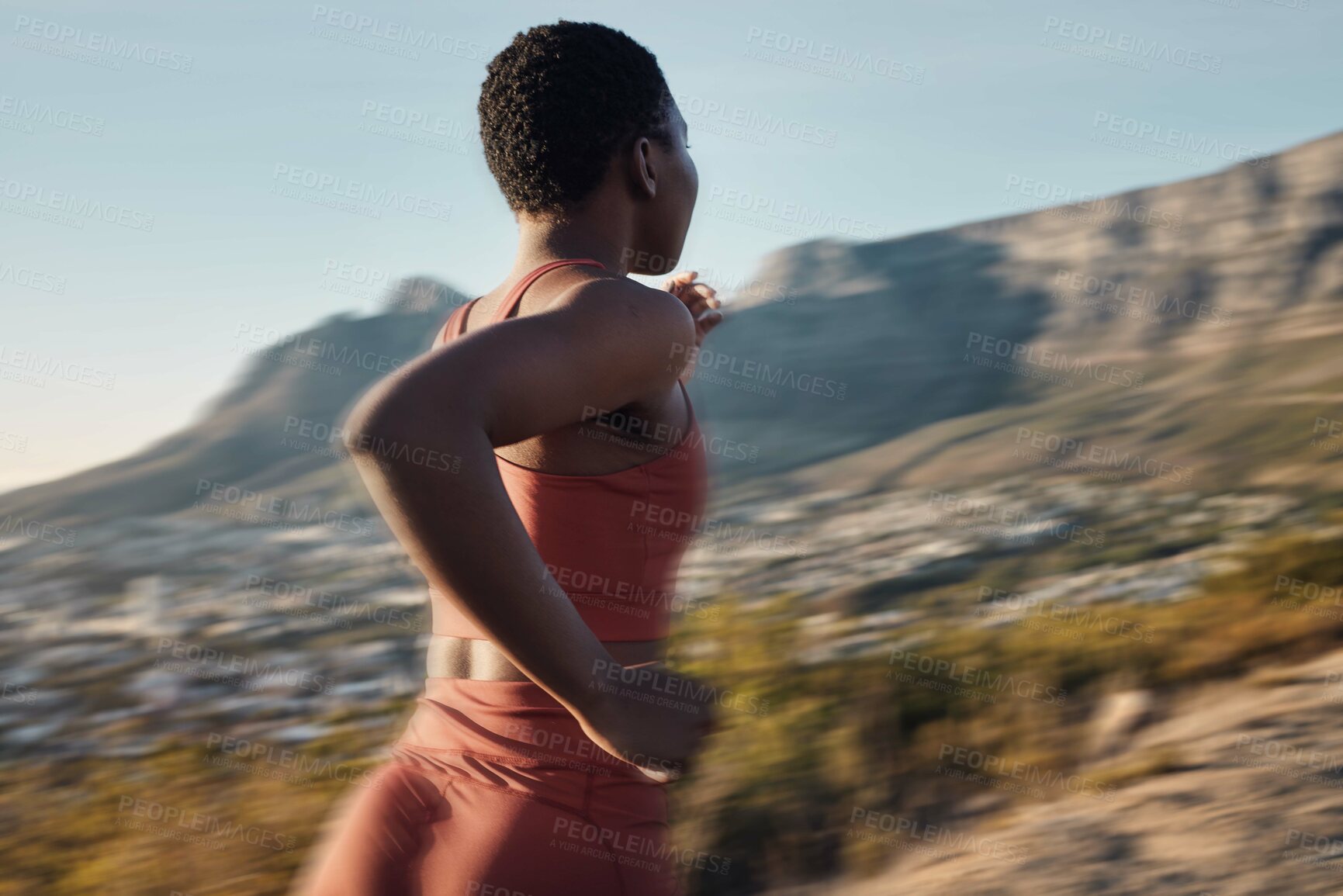 Buy stock photo Exercise, fitness and back of black woman running in nature for heart health and wellness. Sports motion blur, training and female runner exercising, jog or cardio workout outdoors with fast speed.