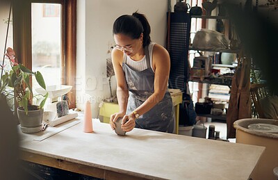 Buy stock photo Creative, small business and pottery girl working with clay for idea, inspiration and art process. Creativity, business owner and asian woman focused at artistic workspace in Tokyo, Japan

