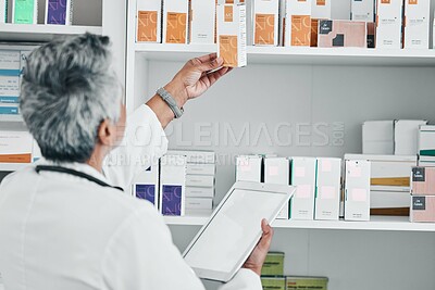 Pharmacy, tablet and mockup with senior woman in store for healthcare, wellness or retail. Product, technology and prescription with pharmacist and medicine stock for shopping, medical or inventory