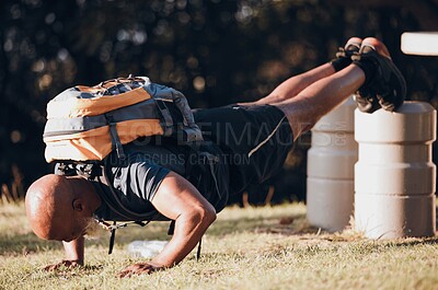 Buy stock photo Exercise, black man and push up for training, outdoor and training for wellness, workout challenge and fitness. African American male, athlete and guy with backpack, park and motivation for energy 