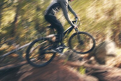 Buy stock photo Cycling, sport motion blur and man on a bicycle in a dirt forest road doing training and exercise. Biker, outdoor trail and athlete with cardio and energy on adventure for fitness on path