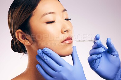 Buy stock photo Lips injection, skincare and woman with plastic surgery in studio isolated on a white background. Cosmetics, syringe and female model with lip filler for dermatology, facelift treatment and beauty.