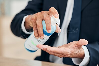 Buy stock photo Hand sanitizer, business man and gel for hygiene, safety and bacteria at an office desk for wellness. Professional person with product for healthcare, cleaning and health or virus or germ protection