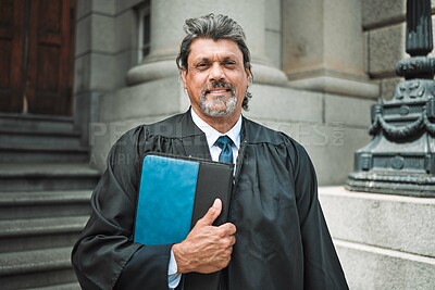 Buy stock photo Portrait, book and a senior man judge at court, outdoor in the city during recess from a legal case or trial. Smile, authority and power with a confident magistrate in an urban town to practice law