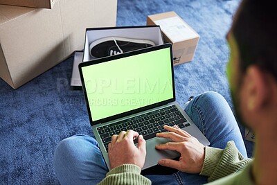 Buy stock photo Online shopping, man with laptop, green screen and boxes on floor, shoes and delivery service on digital app. Sale, discount and ecommerce on fashion retail brand website, internet search on computer