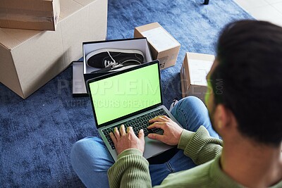 Buy stock photo Ecommerce, man with computer, green screen and box on carpet, shoes and delivery service on digital app. Sale, discount and online shopping on fashion retail brand website, internet search on laptop.