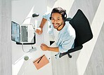 Call center, customer support and above portrait of man for consulting, networking and online help in office. Telemarketing, communication and happy worker smile for CRM business, service and contact