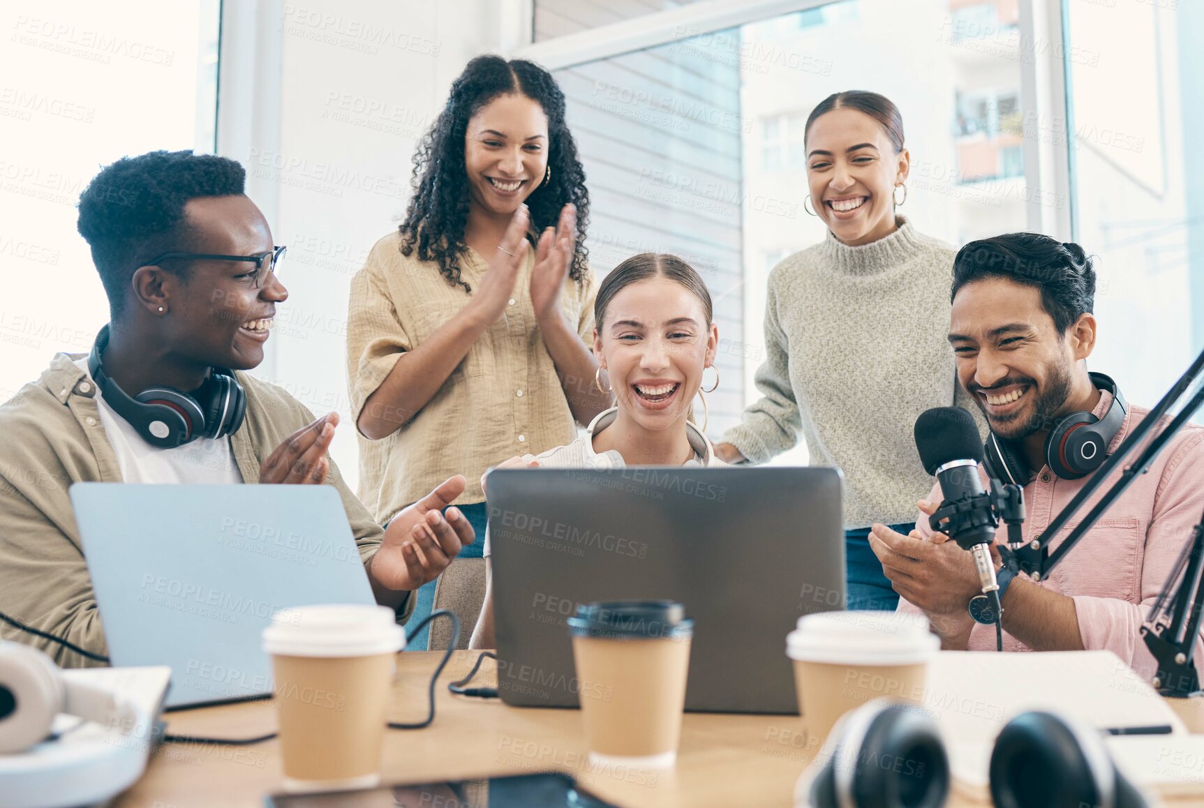 Buy stock photo Celebration, radio group and people with applause, laptop and prize with internet, giveaway and excited. Happy staff, men and women with a podcast, connection and achievement with happiness and prize