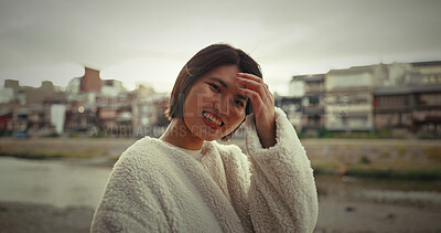 Buy stock photo Woman, japan and portrait with a smile from travel, vacation, and holiday with freedom in a city. Japanese person, journey and laugh on a urban road with adventure in Tokyo with modern fashion 