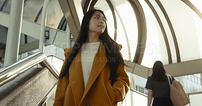 Buy stock photo Stairs, thinking and Japanese woman in city for morning commute, travelling and journey in urban town. Sunshine, walking and person on steps in metro location for adventure, explore or ideas in Tokyo