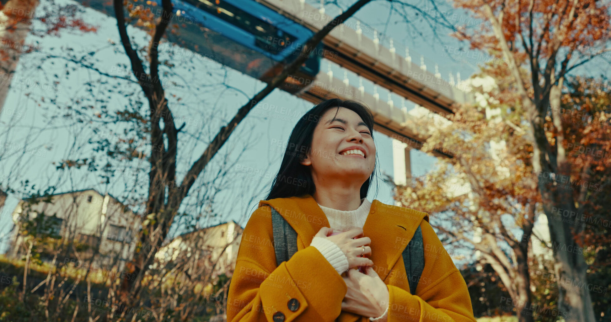 Buy stock photo Japanese, woman and happy travel in park on vacation, adventure and explore path with trees in autumn. Gen z, student and happy walk on holiday in nature, forest and train rail in Kyoto woods