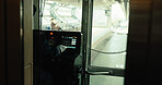 Subway, driver and cockpit of train in transport, service and control panel in Japan railway cab. Metro, travel and man in cabin with uniform, dashboard and arrive at platform on schedule for journey