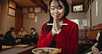 Restaurant, praying and Japanese woman with food for lunch, dinner and supper in cafeteria. Happy, smile and person with prayer hand gesture and chopsticks for eating meal, wellness and nutrition