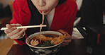 Woman, mouth and eating ramen in restaurant for dinner, meal and noodles in cafeteria. Closeup, hungry lady and chopsticks for bowl of spaghetti, Japanese cuisine and lunch break in fast food diner 