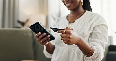 Buy stock photo Hands, woman and credit card with smartphone on sofa for online shopping, payment and fintech at home. Closeup, mobile banking and finance for sales, password and code for ecommerce, money or savings