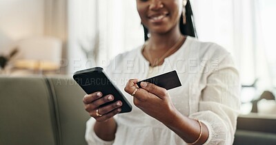 Buy stock photo Hands, woman and credit card with smartphone on sofa for online shopping, payment and fintech at home. Closeup, mobile banking and finance for sales, password and code for ecommerce, money or savings