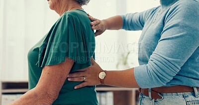 Hands of woman, back pain or physiotherapy for patient with help in physical therapy rehabilitation. Chiropractic, chiropractor or physiotherapist massaging spine or muscle injury for body healing