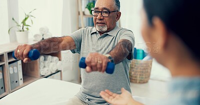 Senior care, rehabilitation and physiotherapist with old man, dumbbell and healthcare at nursing home. Physio, exercise and retirement, fitness coach caregiver and elderly patient mobility training