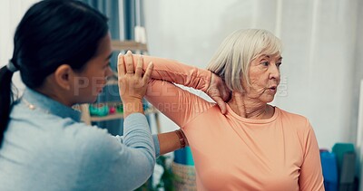Physiotherapist, elderly or woman stretching elbow to help physical therapy for mobility rehabilitation. Senior patient, flexibility or chiropractor with muscle healing exercise for shoulder injury