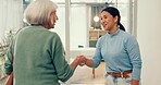 Happy woman, physiotherapist and handshake in elderly care for appointment or schedule meeting at clinic. Female person or medical healthcare professional shaking hands with senior patient in checkup