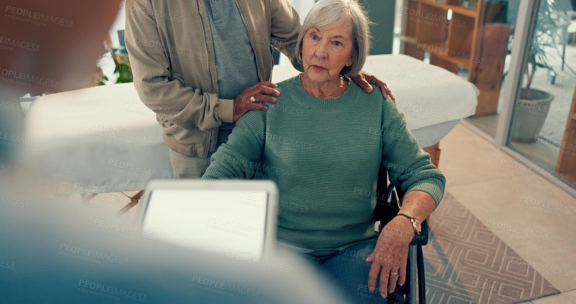 Buy stock photo Wheelchair, doctor and tablet for old woman in a physiotherapy consultation for advice. Support, couple talking or elderly patient with a disability, support and physiotherapist for results in clinic