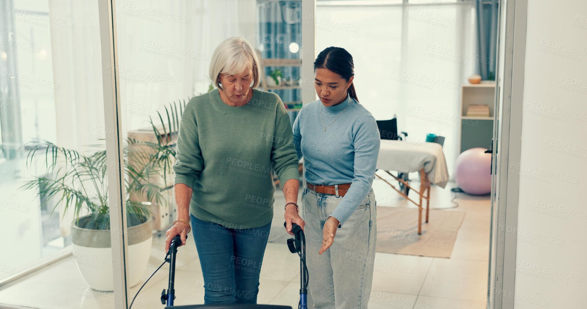 Buy stock photo Senior, physiotherapy and woman with doctor support and helping at a consultation for patient with a disability. Rehabilitation, clinic and person at hospital for physiotherapist and medical advice