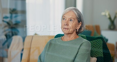 Thinking, face and senior woman on a sofa with dementia, memory loss or Alzheimer in a nursing home. Old age, anxiety and elderly female with depression, crisis or lonely, grief or nostalgic sadness