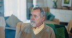 Thinking, dreaming and senior man on a chair in the living room of his retirement home. Calm, relax and peaceful elderly male person with an idea, vision or brainstorming in the lounge of his house.