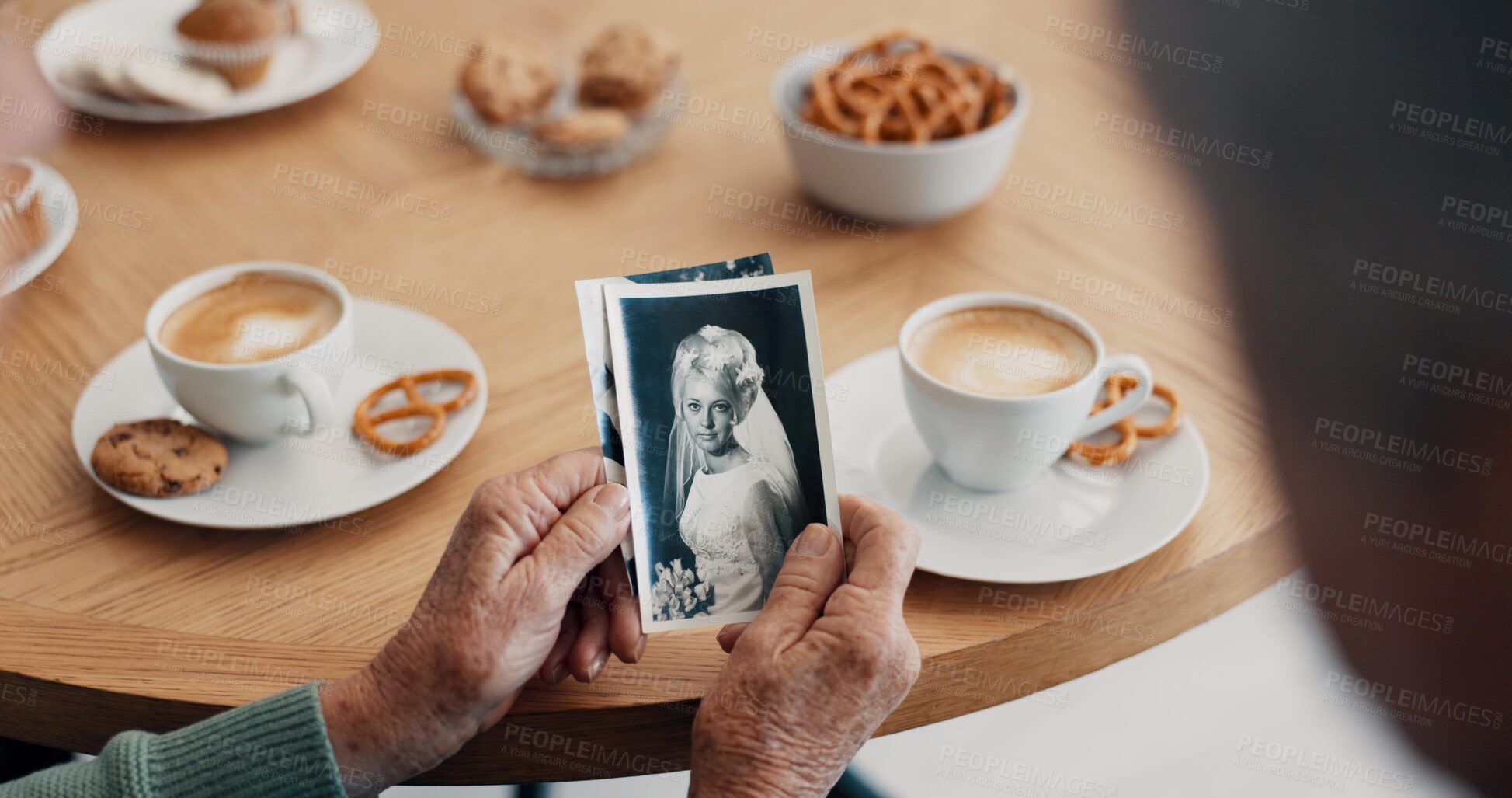 Buy stock photo Senior people, hands and photograph memory in home for nostalgia, history and to remember. Breakfast, elderly friends and pov at tea table with pictures of album, wedding or photography in retirement