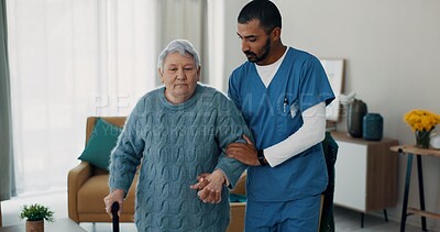 Senior woman, nurse and walking stick for support at a nursing home in retirement. Elderly female patient with a disability and caregiver man for rehabilitation, healthcare or homecare and help
